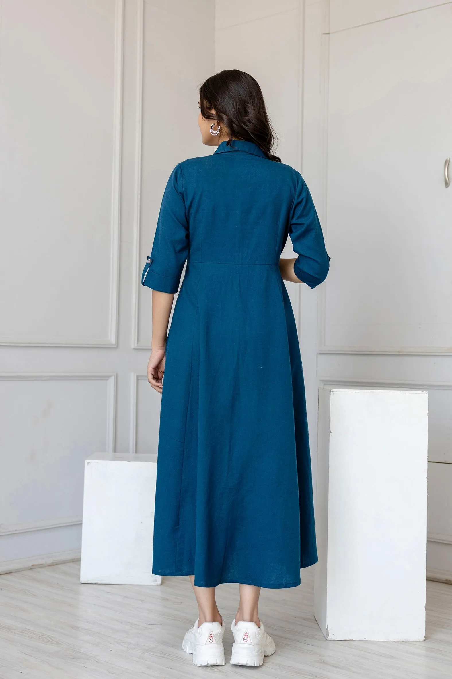 Women Teal Solid Flared Dress With Three Quarter Sleeves