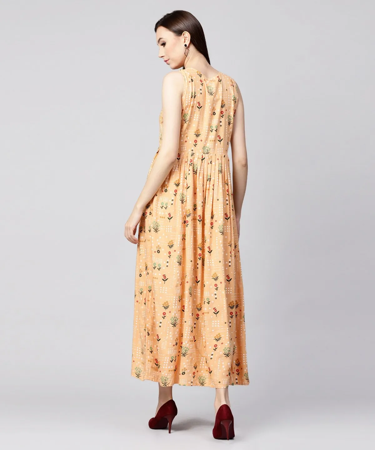 Yellow Printed Sleeveless Rayon A-Line Maxi Dress With Button  In Yokr