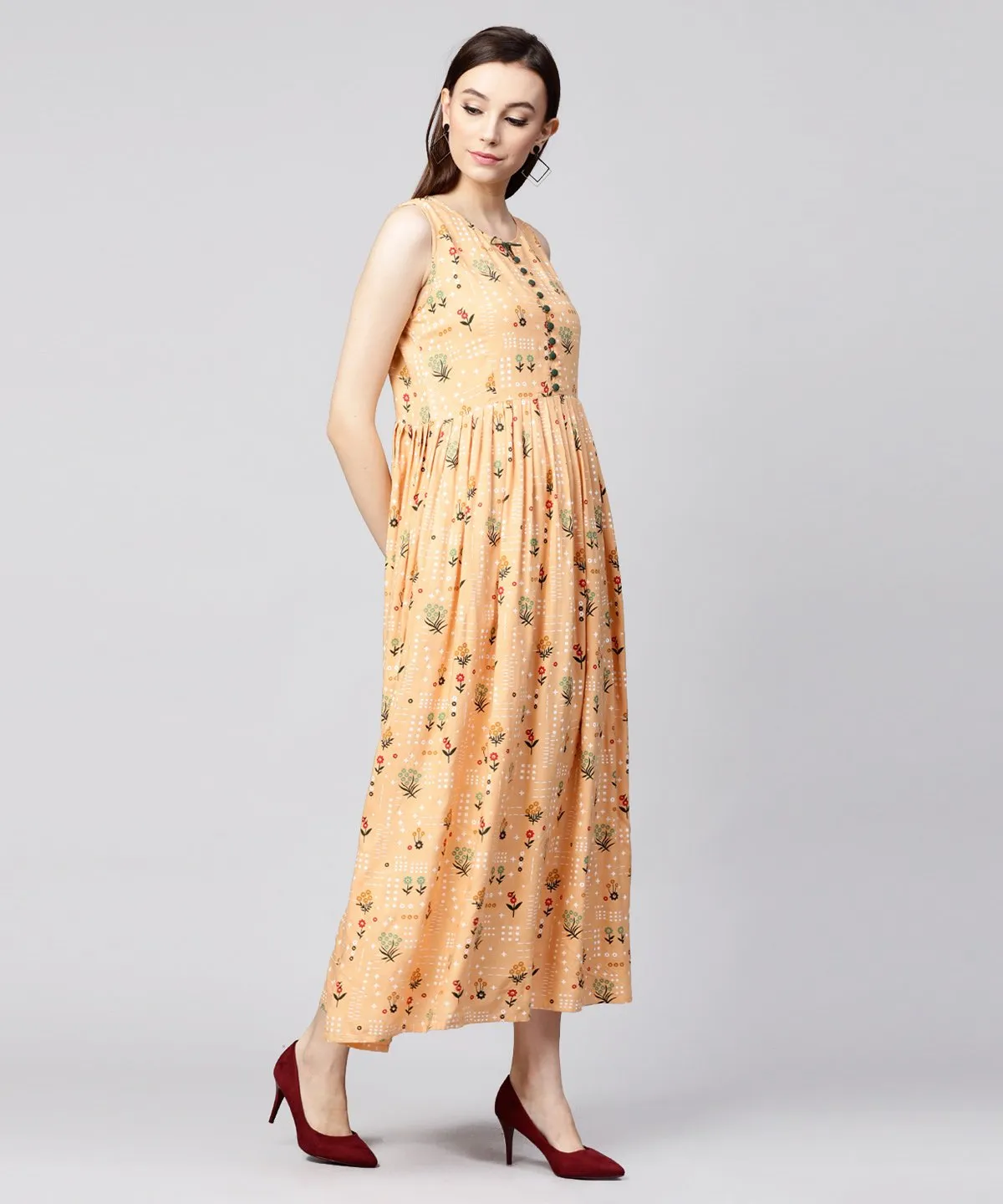 Yellow Printed Sleeveless Rayon A-Line Maxi Dress With Button  In Yokr